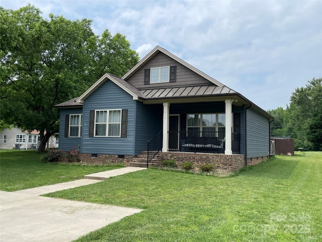 210 Rhyne St, Stanley, NC 28164 - view of front of house featuring covered porch, a front yard, a standing seam roof, crawl space, and metal roof