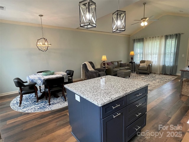 210 Rhyne St, Stanley, NC 28164 - kitchen with dark wood-style flooring, open floor plan, ceiling fan, baseboards, and lofted ceiling
