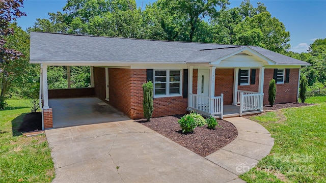 1838 Harmon St, Morganton, NC 28655 - ranch-style house featuring covered porch, driveway, a carport, brick siding, and roof with shingles
