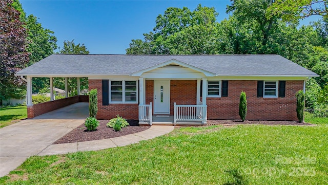 1838 Harmon St, Morganton, NC 28655 - ranch-style home with a porch, driveway, a front lawn, and brick siding