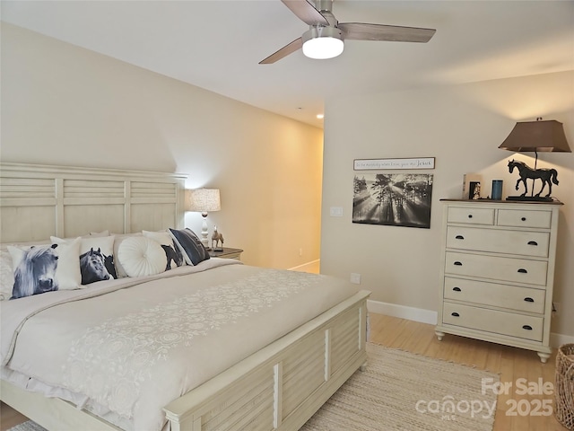 2905 Medlin Rd, Monroe, NC 28112 - bedroom featuring light wood-style floors, baseboards, and ceiling fan