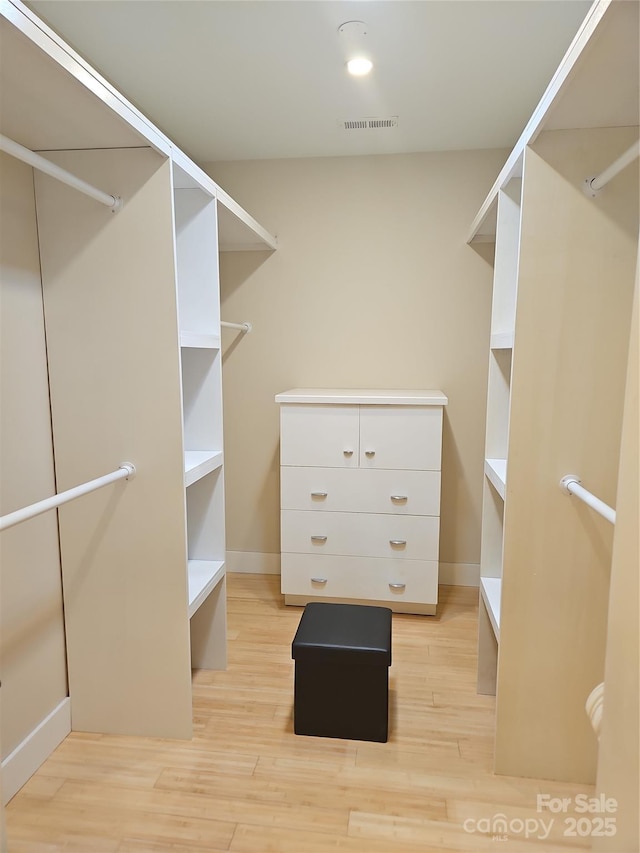 2905 Medlin Rd, Monroe, NC 28112 - walk in closet with light wood-type flooring
