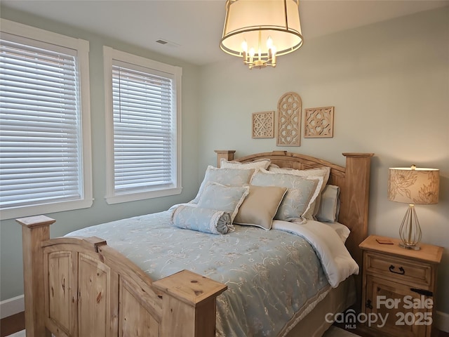 2905 Medlin Rd, Monroe, NC 28112 - bedroom with a chandelier