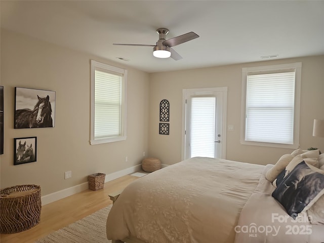 2905 Medlin Rd, Monroe, NC 28112 - bedroom featuring wood finished floors and ceiling fan