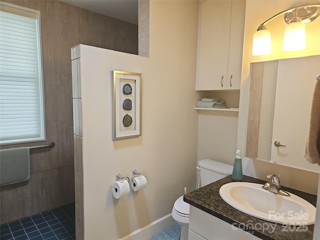 2905 Medlin Rd, Monroe, NC 28112 - bathroom featuring vanity, a walk in shower, and tile patterned floors