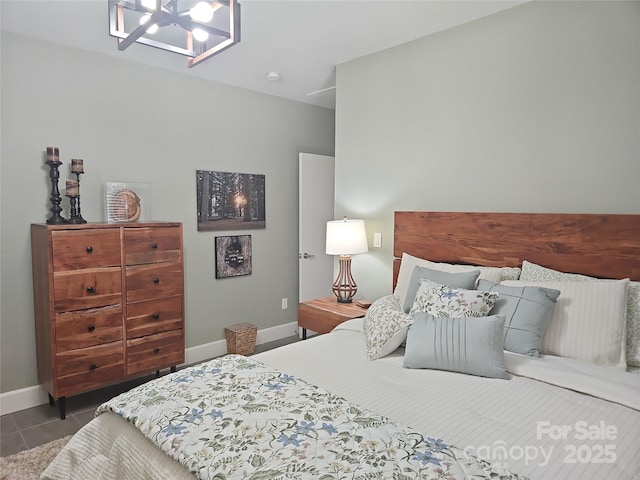 2905 Medlin Rd, Monroe, NC 28112 - bedroom with baseboards and a chandelier