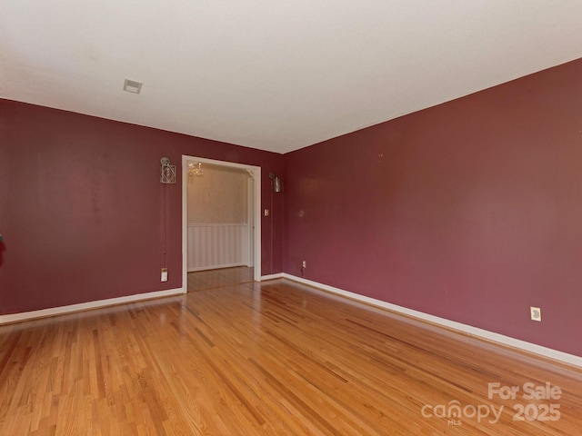 3408 Oak Tree Trl, Matthews, NC 28105 - empty room with light wood-style floors and baseboards