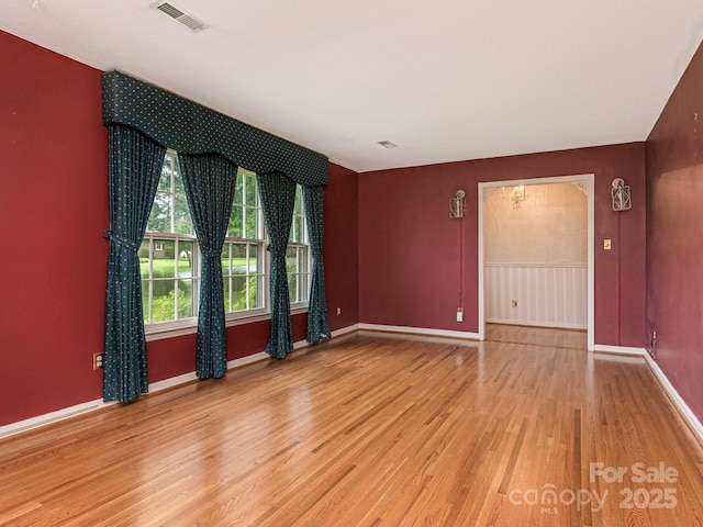 3408 Oak Tree Trl, Matthews, NC 28105 - unfurnished room with light wood finished floors and baseboards