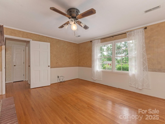 3408 Oak Tree Trl, Matthews, NC 28105 - spare room featuring a ceiling fan and light wood-style floors