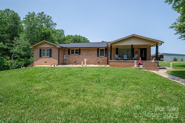 5958 Hoover Elmore Rd, Lincolnton, NC 28092 - single story home with covered porch, a front yard, brick siding, and crawl space