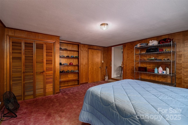 5958 Hoover Elmore Rd, Lincolnton, NC 28092 - carpeted bedroom featuring wood walls and a textured ceiling
