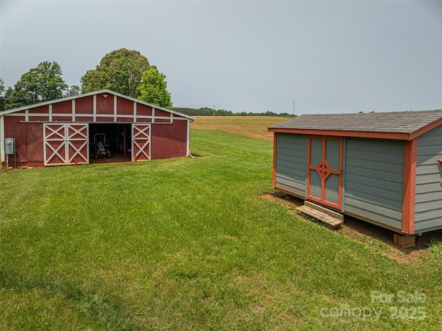 5958 Hoover Elmore Rd, Lincolnton, NC 28092 - view of grassy yard featuring an outdoor structure, a barn, and entry steps