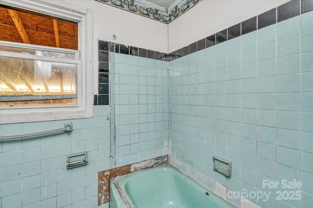 714 Pine St, Hamlet, NC 28345 - bathroom featuring a tub to relax in