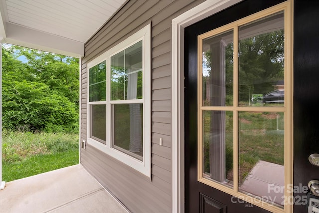 510 3rd St, Salisbury, NC 28144 - doorway to property featuring covered porch