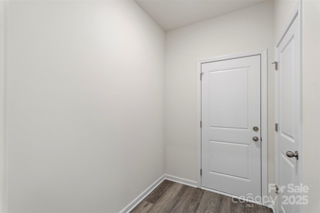 510 3rd St, Salisbury, NC 28144 - doorway featuring dark wood-style floors and baseboards
