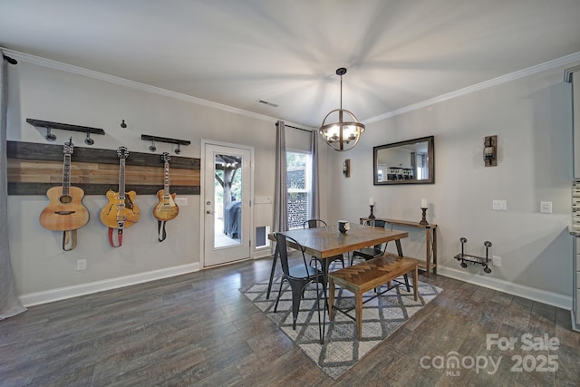 5424 Tilley Manor Dr, Matthews, NC 28105 - dining room with dark wood finished floors, a chandelier, and crown molding