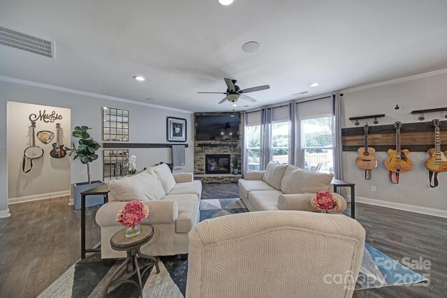 5424 Tilley Manor Dr, Matthews, NC 28105 - living area with crown molding, recessed lighting, a stone fireplace, wood finished floors, and ceiling fan