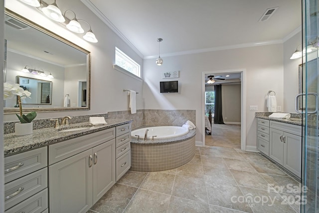 5424 Tilley Manor Dr, Matthews, NC 28105 - full bath with crown molding, vanity, a bath, ceiling fan, and a shower stall