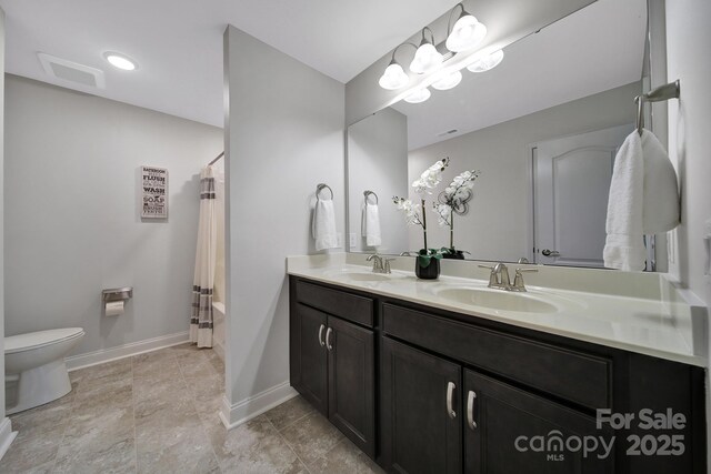 5424 Tilley Manor Dr, Matthews, NC 28105 - bathroom featuring double vanity and shower / tub combo