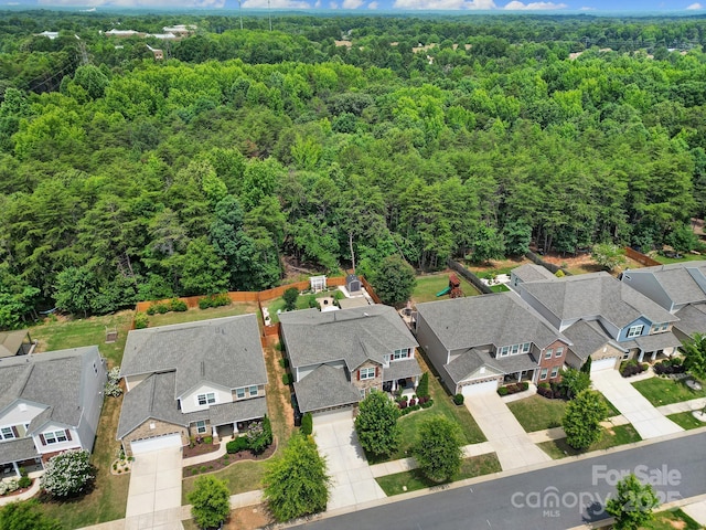 5424 Tilley Manor Dr, Matthews, NC 28105 - aerial view of residential area with a heavily wooded area
