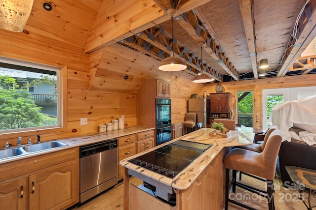 193 Falls View Dr, Lake Toxaway, NC 28747 - kitchen with black appliances, wooden walls, a center island, wood ceiling, and a kitchen bar