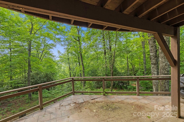 193 Falls View Dr, Lake Toxaway, NC 28747 - view of patio featuring a wooded view