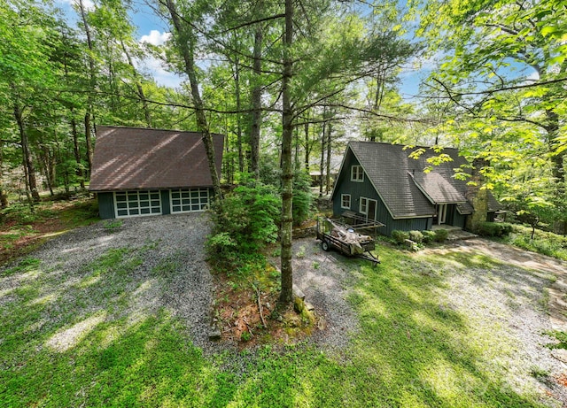 193 Falls View Dr, Lake Toxaway, NC 28747 - view of side of property featuring an outdoor structure and a shingled roof