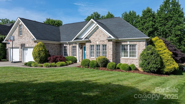 179 Browning Dr, Taylorsville, NC 28681 - view of front facade with brick siding, a front yard, driveway, and a shingled roof
