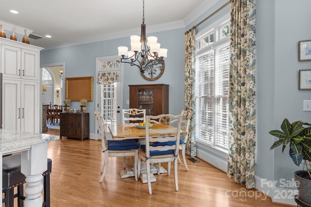 1629 Southpoint Ln, New London, NC 28127 - dining space with a chandelier, ornamental molding, light wood-style floors, baseboards, and recessed lighting