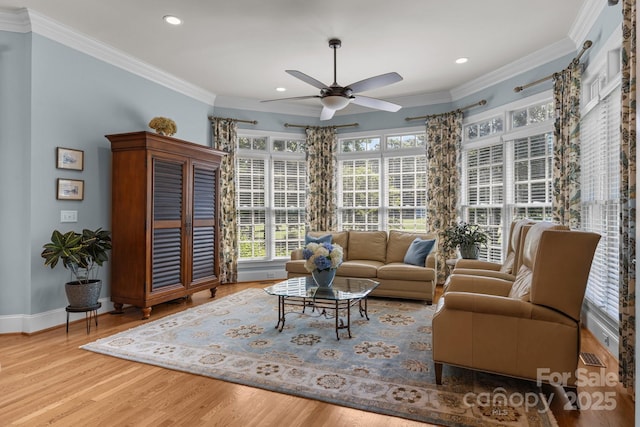 1629 Southpoint Ln, New London, NC 28127 - living room featuring ceiling fan, wood finished floors, ornamental molding, recessed lighting, and baseboards