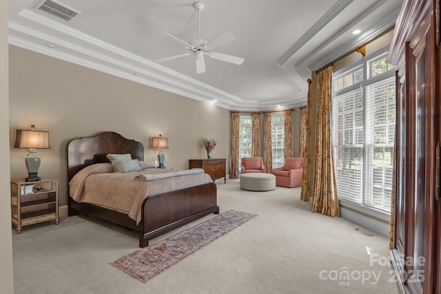 1629 Southpoint Ln, New London, NC 28127 - bedroom with carpet, a tray ceiling, crown molding, multiple windows, and recessed lighting