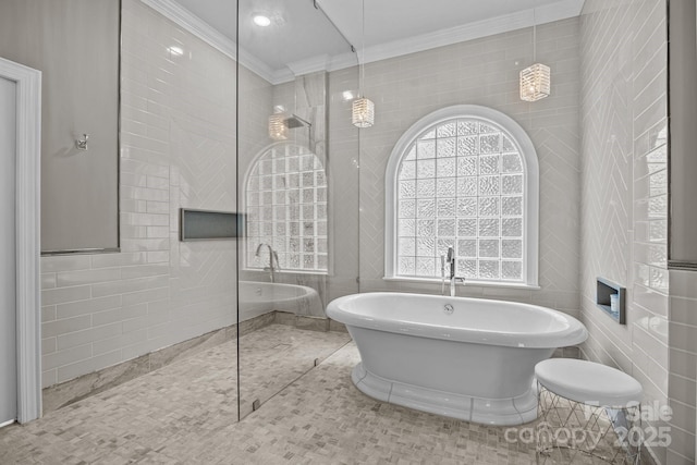1629 Southpoint Ln, New London, NC 28127 - bathroom with crown molding, a soaking tub, a walk in shower, tile walls, and tile patterned floors