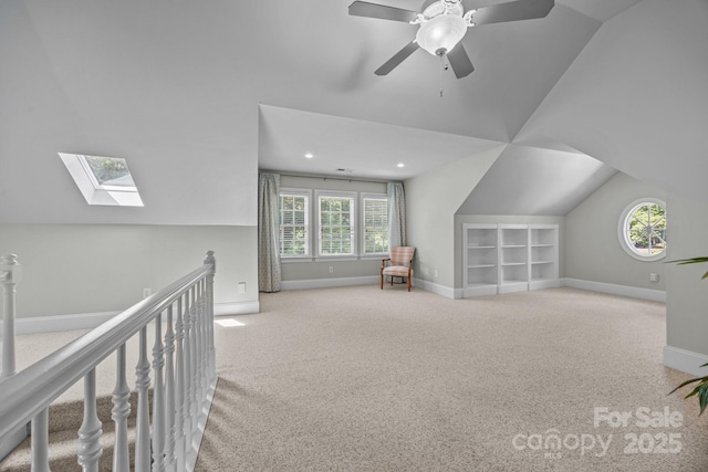1629 Southpoint Ln, New London, NC 28127 - additional living space with lofted ceiling, built in features, carpet, plenty of natural light, and recessed lighting