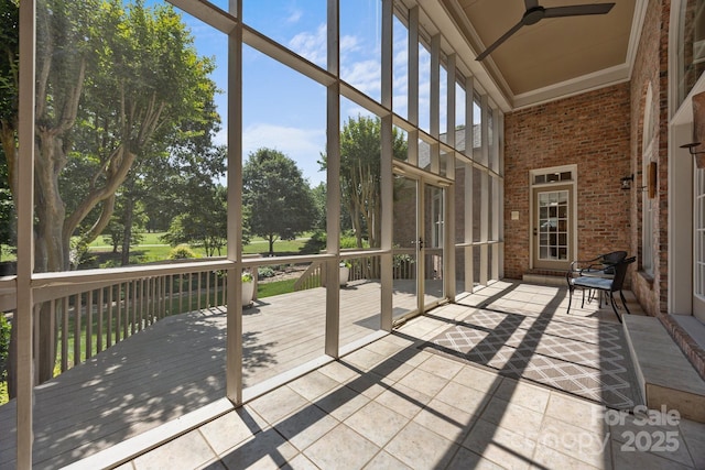 1629 Southpoint Ln, New London, NC 28127 - unfurnished sunroom featuring a ceiling fan