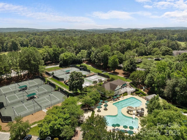 1629 Southpoint Ln, New London, NC 28127 - aerial view of a heavily wooded area and a pool