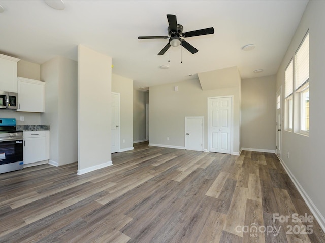 102 Mobley St, Clover, SC 29710 - unfurnished living room featuring wood finished floors and ceiling fan
