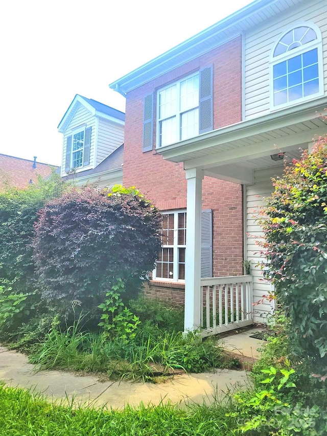 3509 Joel Turner Dr, Charlotte, NC 28216 - view of property exterior featuring brick siding