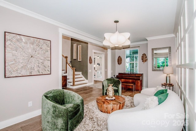 13708 Huntson Park Ln, Huntersville, NC 28078 - living area with wood finished floors, crown molding, and stairway