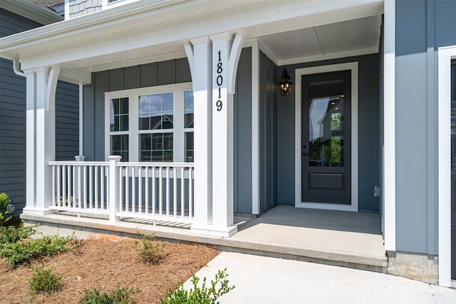 18019 Wilbanks Dr, Charlotte, NC 28278 - entrance to property featuring a porch and board and batten siding