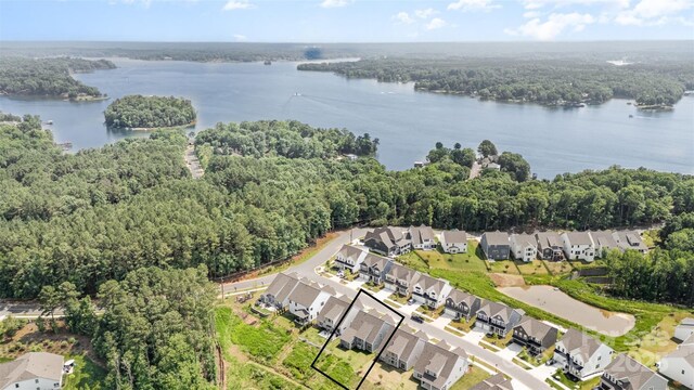 18019 Wilbanks Dr, Charlotte, NC 28278 - aerial overview of property's location with a heavily wooded area, a nearby body of water, and nearby suburban area