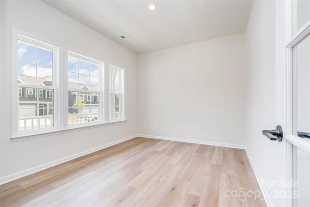 18019 Wilbanks Dr, Charlotte, NC 28278 - spare room featuring light wood-style floors, baseboards, and recessed lighting