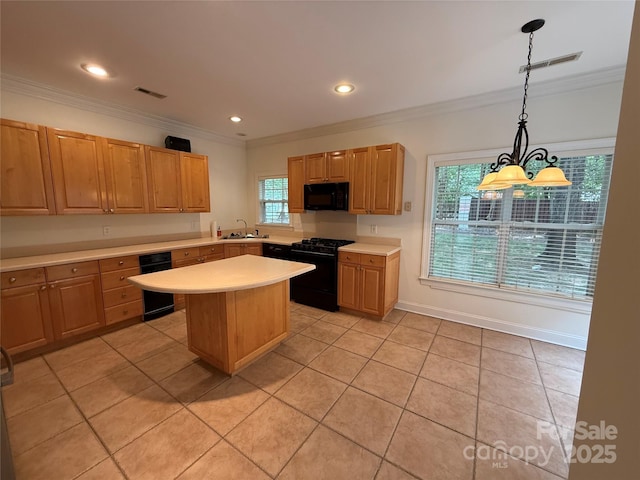 9177 Bonnie Briar Cir, Charlotte, NC 28277 - kitchen with black appliances, crown molding, a sink, light countertops, and healthy amount of natural light