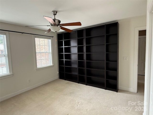 9177 Bonnie Briar Cir, Charlotte, NC 28277 - unfurnished bedroom with carpet, multiple windows, baseboards, and ceiling fan
