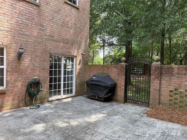 9177 Bonnie Briar Cir, Charlotte, NC 28277 - view of patio featuring area for grilling and a gate