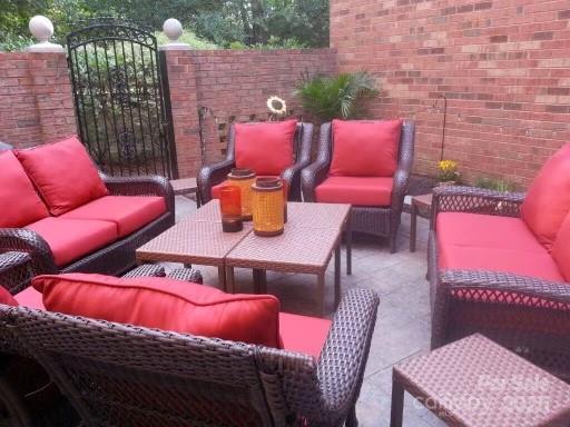 9177 Bonnie Briar Cir, Charlotte, NC 28277 - view of patio featuring outdoor lounge area and a gate