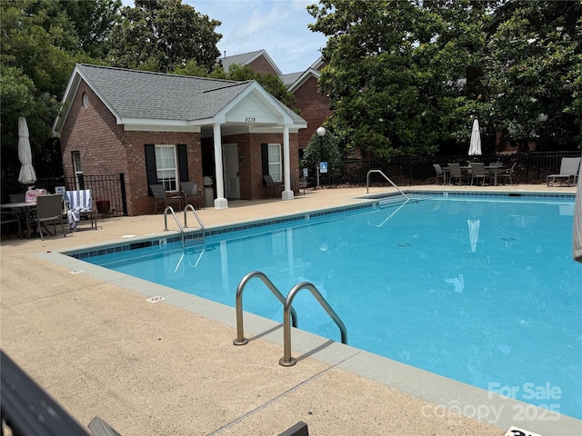 9177 Bonnie Briar Cir, Charlotte, NC 28277 - community pool with a patio