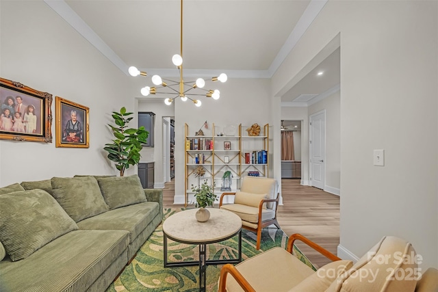 513 Meadow Ridge Dr, Belmont, NC 28012 - living room featuring a chandelier, light wood-type flooring, ornamental molding, and baseboards