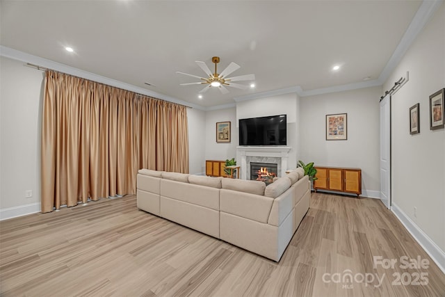 513 Meadow Ridge Dr, Belmont, NC 28012 - living area with light wood-type flooring, a ceiling fan, recessed lighting, a premium fireplace, and baseboards
