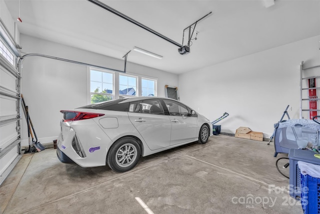 513 Meadow Ridge Dr, Belmont, NC 28012 - garage featuring a garage door opener