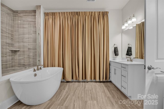 513 Meadow Ridge Dr, Belmont, NC 28012 - full bath with vanity and a freestanding tub